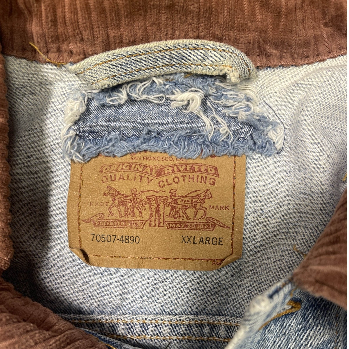 Levi’s Original Riveted Blue Jean Jacket with a Pinkish Collar